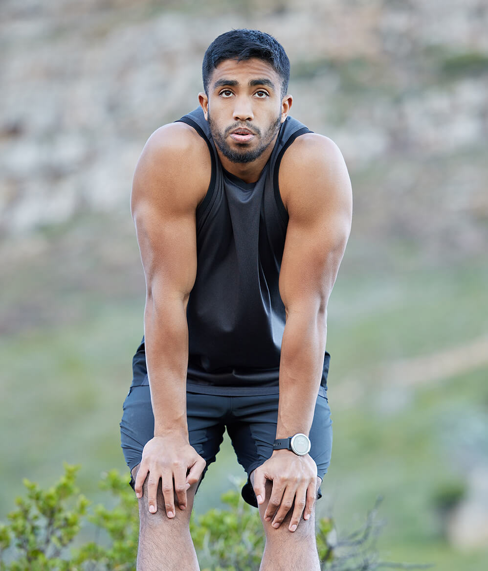 shot-of-a-handsome-young-man-taking-a-moment-to-ca-2025-04-05-17-25-36-utc (1)