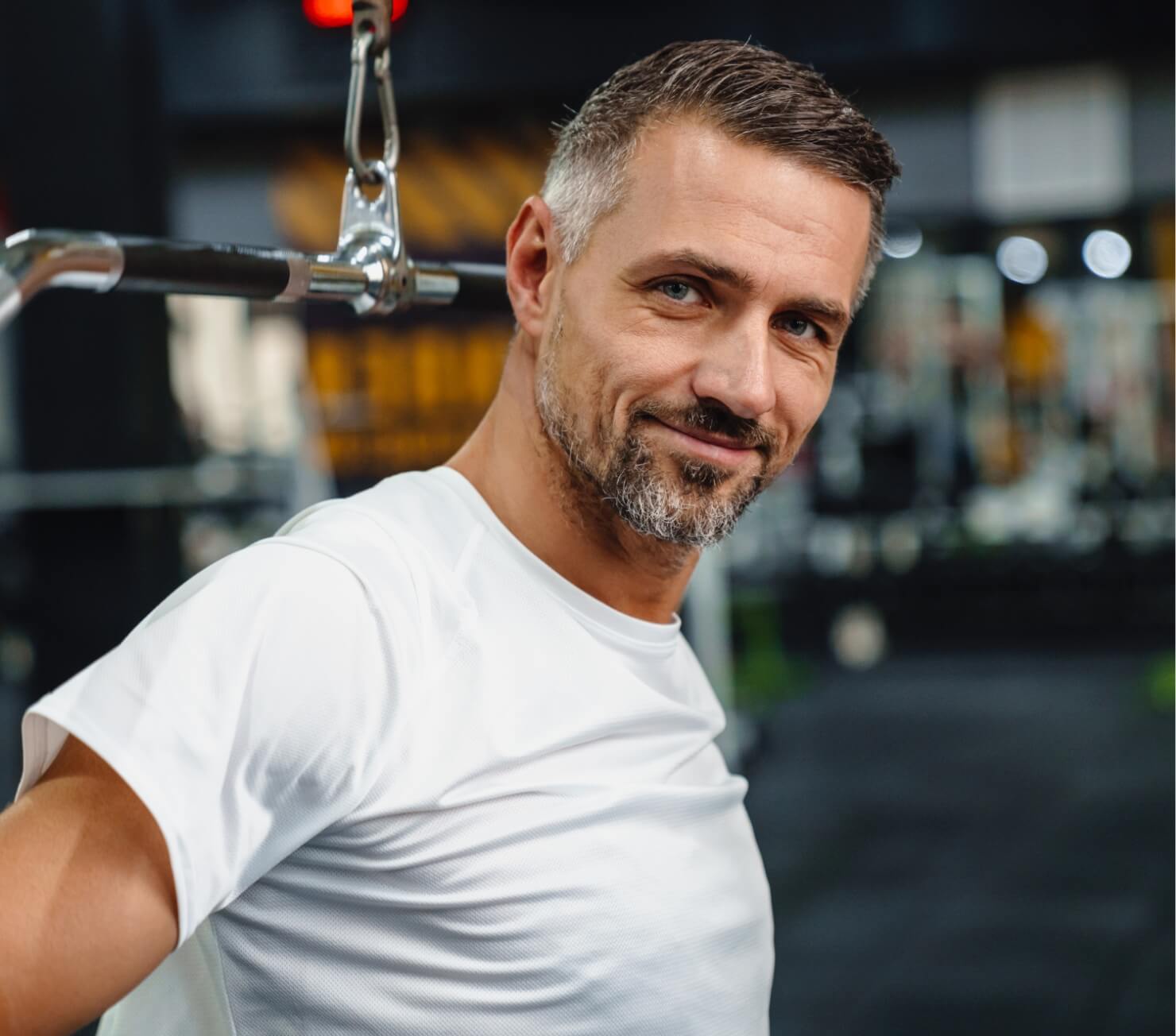 smiling-grey-adult-sportsman-working-out-with-exer-2025-02-14-03-45-30-utc-2