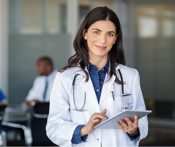 doctor-holding-digital-tablet-at-meeting-room-2023-11-27-05-32-49-utc (1)